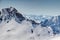 White rock wall in Wetterstein mountains and jagged Stubai Alps