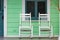 White Rocking Chairs on New Orleans Porch