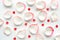 White rose petals on white background. Valentine or wedding abstract background.