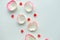 White rose petals on white background. Valentine or wedding abstract background.