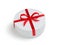 White round cilinder gift box with red bow