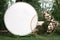 White round european style wedding photozone decorated with flowers