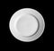 White round plate isolated on black top view