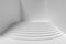 White round stairs in empty white room with shadow
