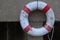 White rubber ring with red ring, symbol of emergency, rescue in emergency, sunken ship.