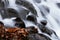 White Rushing Water Flowing Over Exposed Jagged Rocks