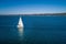 White sailboat navigating Port Phillip Bay.