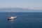 White sailboat near Hydra island, Greece