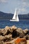 White sailboat in Sardinia, Costa Esmeralda, Italy