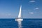 White sailboat in the sea