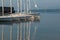 White Sailboats Anchored on Serene Sea