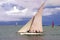 White sailed pirogue