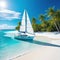 A white sailing yacht anchored in turquoise water near to a picture perfect white sand beach on a tropical island in