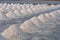 White salt piles in the vast salt fields