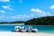 White sand beach crystal clear turquoise water at Kabira Bay, Is