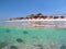 White sand beach and fishes underwater