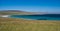 The white sand and blue sea at Sandwick on the island of Unst in Shetland, Scotland, UK