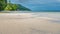 White Sand during Low tide, Water Hut of Homestay in Background on Kri Island. Raja Ampat, Indonesia, West Papua