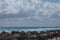 White sandy beach in the Caribbean with rows of huts