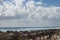 White sandy beach in the Caribbean with rows of huts