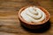 white sauce. small wooden bowl with mayonnaise on the kitchen table.