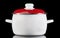 White saucepan, isolated on black background.