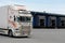 White Scania Refrigerated Transport Truck at Warehouse Yard