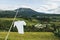 White scarecrow on Jatiluwih rice terraces in Bali. Scenic mountain view.