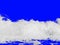 White sea foam from the surf, isolated on a bright royal blue background