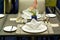 White serviette decorated on dinner set table