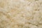 White shaggy fur texture background. beige wool