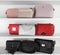 White shelving unit with stylish purses, closeup