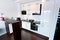 White and shiny kitchen interior