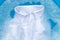 White shirt soak in powder detergent water dissolution, washing  cloth.