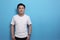 White shirt template, male model wearing white shirt against blue background