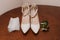 White shoes, groom's boutonniere. Bride's morning, wedding accessories