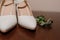 White shoes, groom's boutonniere. Bride's morning, wedding accessories