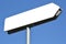 White signpost with one arrow, sky in background.
