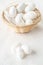 White silkworm cocoons shells, source of silk fabric