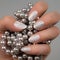White silver glittered nails manicure