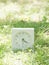 White simple clock on lawn yard, 4:20 four twenty