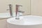 White sink, faucet and mirror