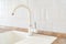 white sink and kitchen faucet. plumbing for home