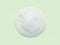 White skincare cleanser foam texture isolated on pastel green background