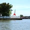 White slant pagoda located at river side