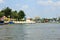 White slant pagoda located at river side at Koh Kret