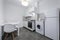 White, small and compact kitchen