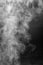 White smoke or dense steam on black background, texture, overlay