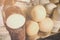 White and smoked scamorza in the basket, Italian typical cheese collection on the vitrine of market . French , Scamorze and