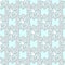 White snowflakes on pale blue background, damask ornament seamless pattern. Paper cut style